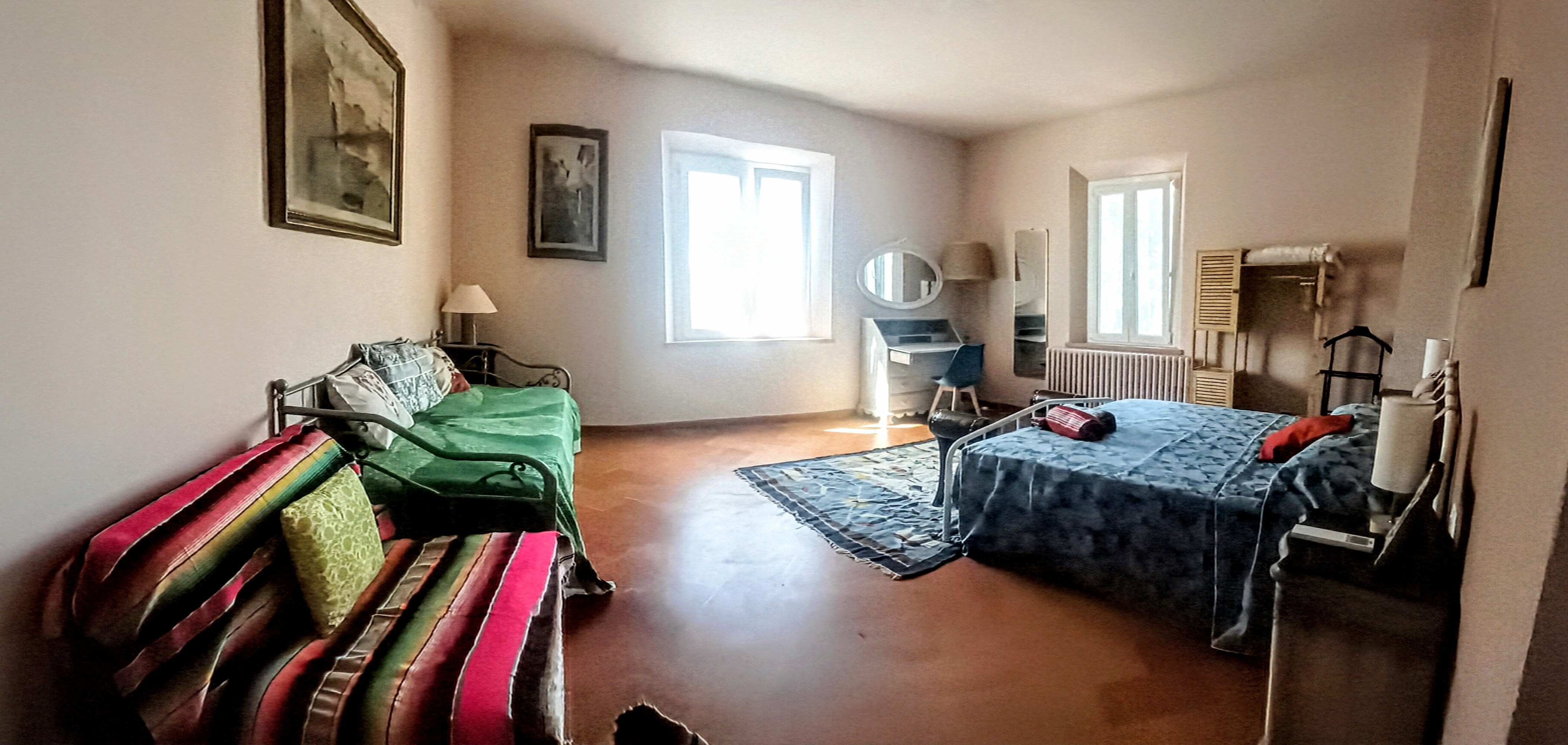 La Rosa Room at Genevieve Grove, a spacious and comfortable guest room in the Tuscan countryside.
